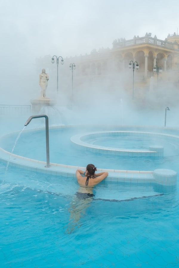 soaking in szechenyi baths budapest